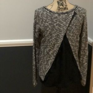 light black and white sweater; sheer back